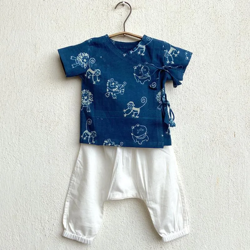 UNISEX ORGANIC ZOO PRINT INDIGO ANGARAKHA TOP   WHITE PANTS